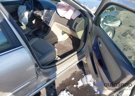 2002 Nissan Maxima Gle z USA, uszkodzony, nr VIN JN1DA31A32T001574